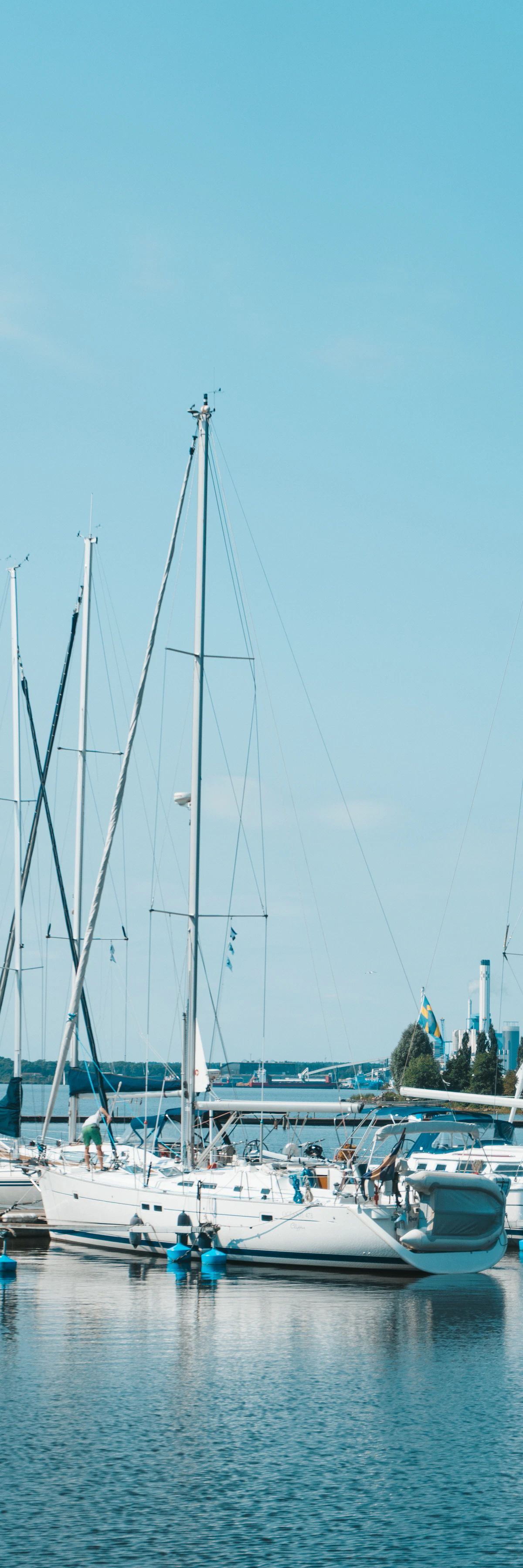 Sailing boats in the guest harbour in Västerås on a summer day by Lake Mälaren.